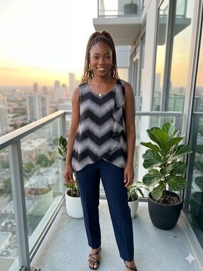 Chevron-Pattern Sleeveless Top with Navy Trousers